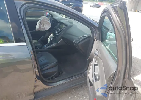 2014 Ford Focus Titanium from USA, damaged, VIN 1FADP3J23EL233221